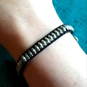 Bracelet silver tone metal beads black cord button clasp